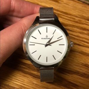 Silver wrist watch, one size fits most.